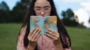 student exchange student holding notebook